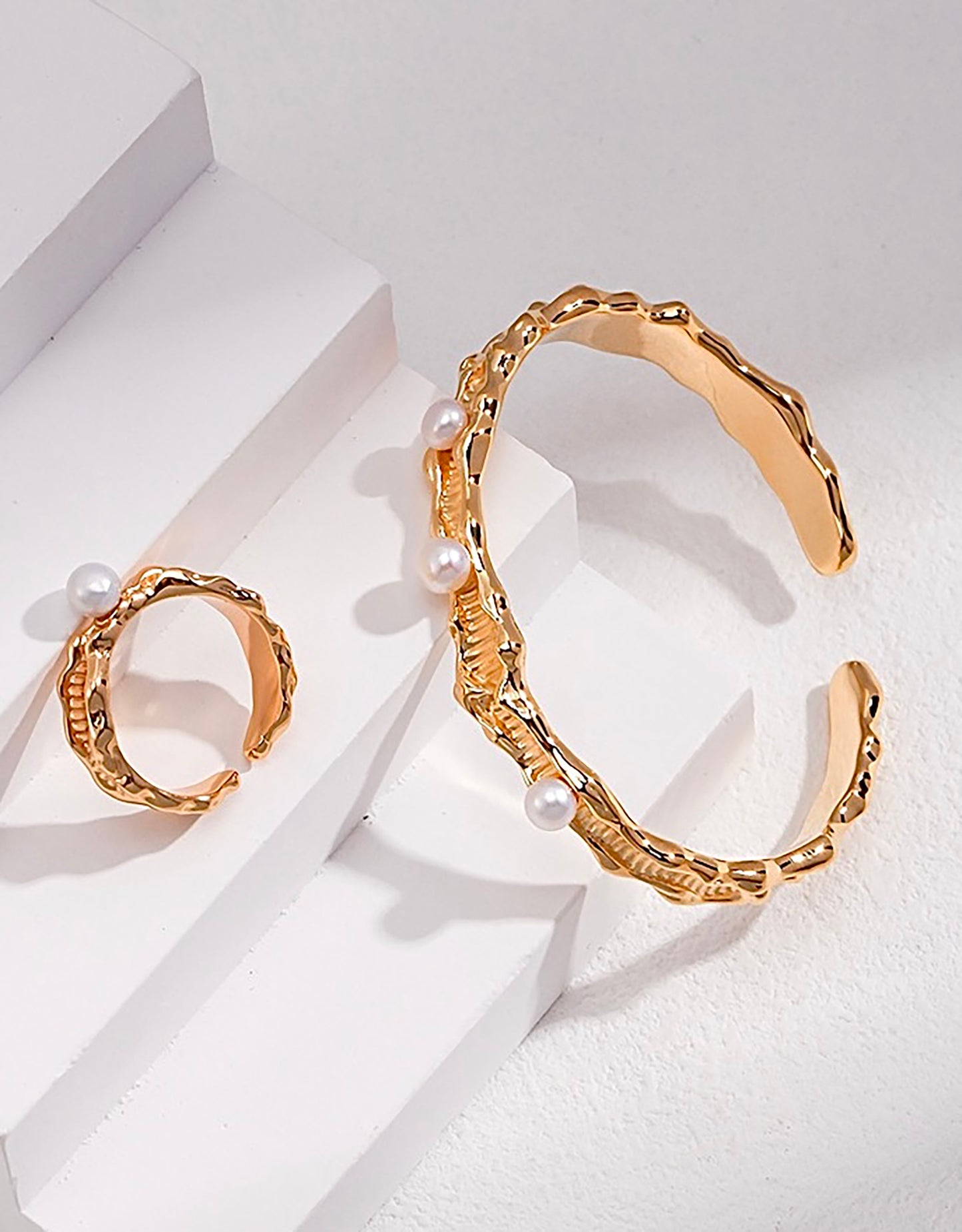 Wave Shaped Gold With Pearls Open Bangle